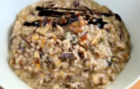 Delicious and creamy risotto with a perfect balance of bitter radicchio, creamy gorgonzola, crunchy walnuts, and sweet balsamic cream.