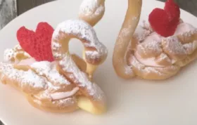 Delicious and elegant chocolate cream puff swans