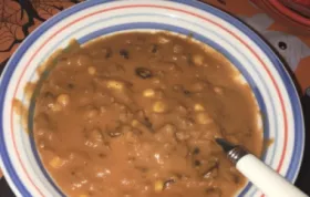 Delicious and hearty cheesy black bean and corn chili recipe