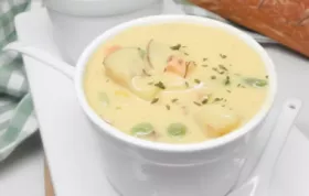 Delicious and hearty vegetable cheese soup with a creamy, cheesy broth