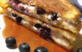 Delicious and indulgent Blueberries and Cream French Toast Sandwich with a tangy Orange Maple Syrup.