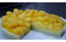 Delicious and refreshing mango custard pie perfect for summer gatherings