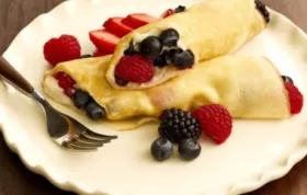 Delicious cheesecake-filled crepe roll-ups