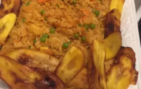 Delicious Nigerian Jollof Rice with Chicken and Fried Plantains
