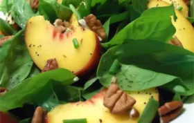 Delicious Spinach Salad with Fresh Peaches and Crunchy Pecans