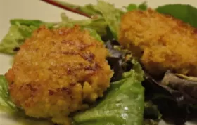 Deviled Crab Cakes on Mixed Greens with Ginger Citrus Vinaigrette