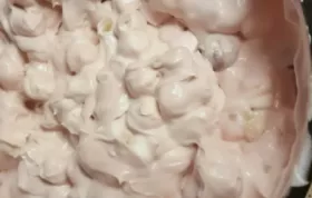 Indulge in a fluffy, sweet treat with this Marshmallow Pink Cloud Delight recipe.