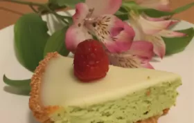"Indulge in the creamy sweetness of white chocolate and the earthy notes of matcha in this delightful cheesecake tart."