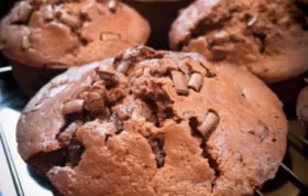 Indulge in the delectable taste of these moist chocolate muffins