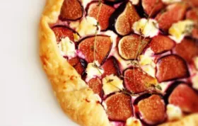 Indulge in the perfect combination of sweet figs and creamy goat cheese with this delectable tart.