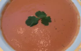 Indulge in the rich and velvety flavors of this Creamy Tomato Bisque