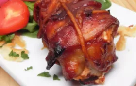 Juicy chicken bombs wrapped in crispy bacon with a spicy kick of jalapenos