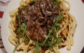 Savory and comforting Pasta with Braised Beef and Baby Arugula