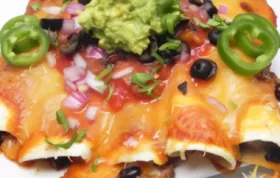 Spice up your dinner with these delicious beef enchiladas made with homemade sauce.