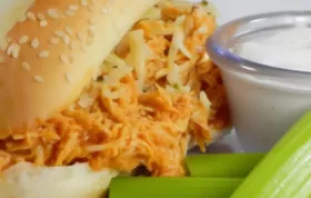 Spice up your week with these delicious slow cooker buffalo chicken sandwiches!