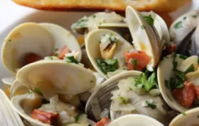 Spicy and savory chorizo steamed clams for a delicious seafood meal