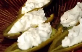 Spicy and tangy feta-stuffed jalapenos for a flavorful appetizer