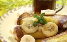 This indulgent breakfast recipe combines the flavors of fresh bananas and cinnamon in a delightful roll-up French toast.